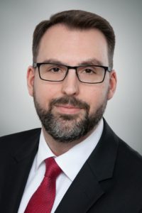 Dr. Christian L. Geminn